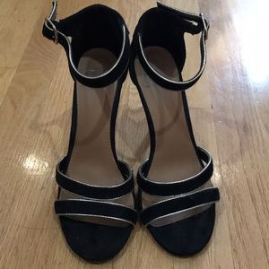 Black and gold heels